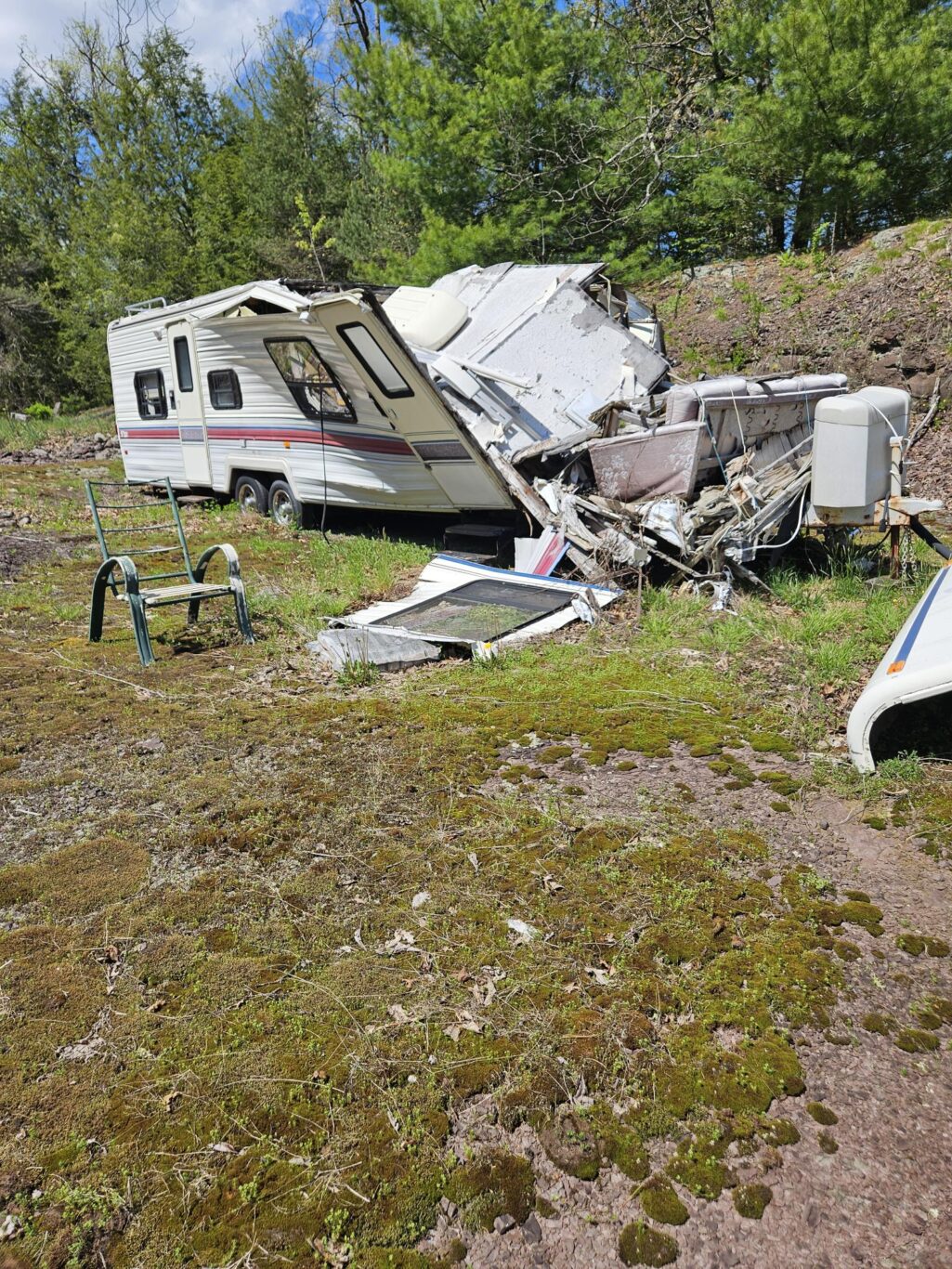 If your RV has been totaled, structurally compromised, or declared a total loss by insurance, it can quickly become an eyesore and an environmental hazard on your property.